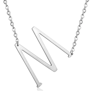 Close-up of a silver stainless steel necklace with a large letter M pendant on a O-chain