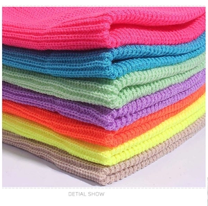 Detail show of stacked colorful knit skull caps with high-elastic thick knitted textures