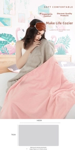 Detail of soft waffle-patterned microfiber bath towels in pink and gray 140x75cm