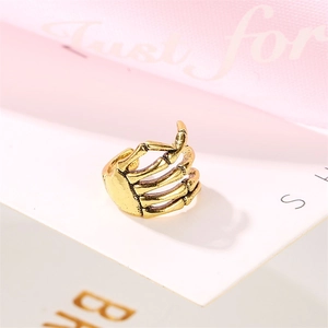 Vintage gold punk skeleton hand open ring with gothic spinal bone design details