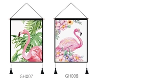 Detail view of two flamingo wall tapestries with tropical leaves and pink floral patterns