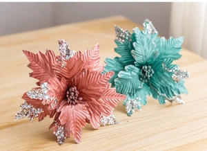 Detail of 25cm velvet Christmas flowers in pink and teal with silver sequins