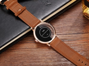 Macro shot of TOMI T080 minimalist half-circle dial with brown litchi leather strap