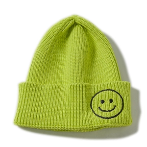 Neon green knitted beanie hat with a black embroidered smiley face for kids and parents