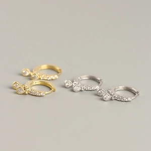 Elegant gold and silver S925 sterling silver huggie hoop earrings with sparkling cubic zirconia