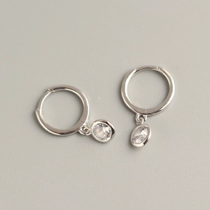 Minimalist S925 sterling silver hoop earrings with round cubic zirconia charms in silver