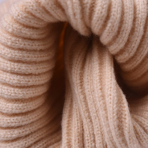 Winter rib-knit beanies for toddlers in beige soft knit with a vertical stripe texture