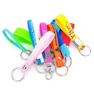 Custom multi-colored silicone wristband keychains with printed logos and metal rings