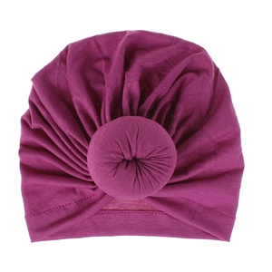 Deep magenta donut knot turban hat for kids in soft pleated knit fabric