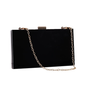 Classic black rectangular hard shell box clutch bag with gold metal chain strap on white