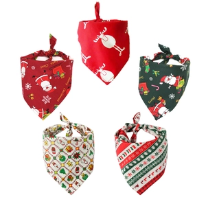 Set of five Christmas dog bandanas with Santa and reindeer patterns on white background