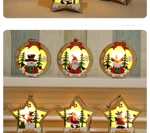 Detail of LED glowing wooden Christmas ornaments with snowman and reindeer illustrations