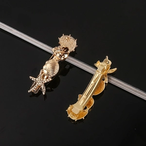 Golden ocean series hair clips featuring starfish shell designs on a premium black background