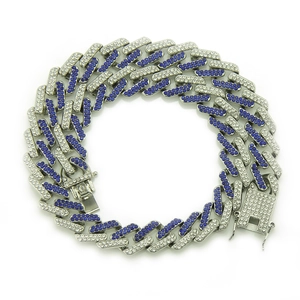 Iced out silver cuban chain necklace with blue and white crystals on white background