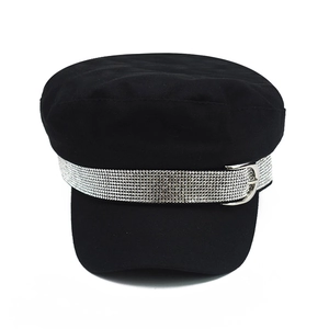 Women's black cotton newsboy cap featuring a decorative silver rhinestone band on the brim