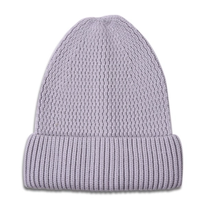 Close-up of lavender knit beanie showing the vertical ribbed texture and folded cuff