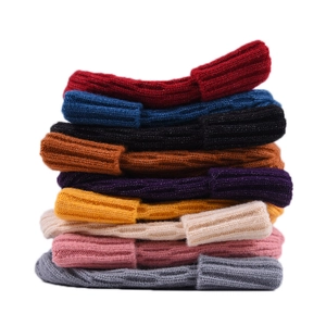 Winter chunky cable knit beanies in multiple colors including red, blue, and yellow