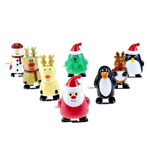 Close-up of wind-up Christmas toys including Santa Claus, snowman, reindeer and penguins