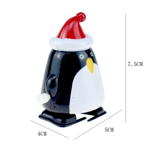 Detailed size specifications for the Christmas penguin wind-up toy at 7.5x5x4CM