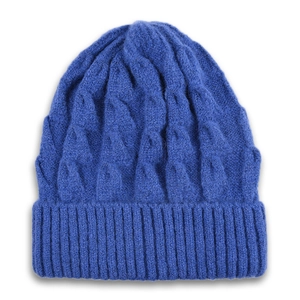 Detail view of the thick cable-knit pattern and ribbed cuff on this bright blue beanie