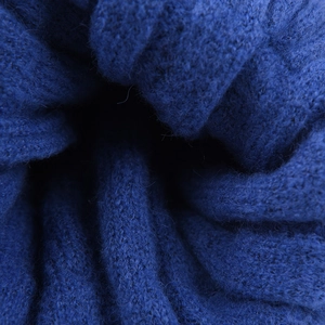 Classic solid blue knit wool beanie with premium soft texture and warm chunky ribbed design