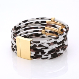 Detail of multi-layer leopard print wrap bracelet with gold magnetic closure