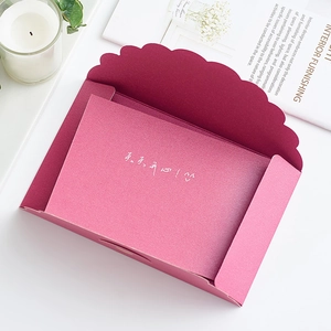 Elegant burgundy pearlescent paper envelope with pink insert card for wedding invitations