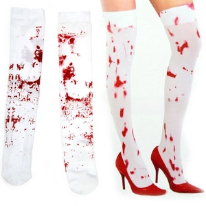 Detail of white over-the-knee socks with vibrant red blood splatter for Halloween costumes