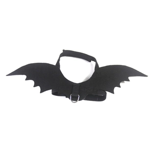 Detail of black felt bat wings pet harness with adjustable straps and metal D-ring buckle