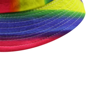 Macro shot of rainbow bucket hat brim featuring multi-row white stitching and fabric texture