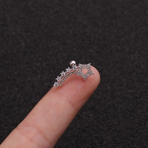 Star zircon stainless steel cartilage stud earring with screw back on fingertip