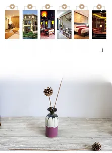 Close-up of ceramic vase with dual-tone flowing glaze in a minimalist Zen interior decor