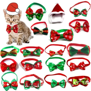 Multiple Christmas pet bow ties and velvet hat set with festive patterns and bells