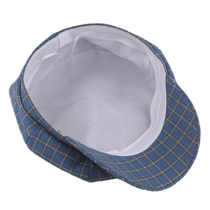 Blue plaid newsboy cap with vintage check pattern and white lining interior view
