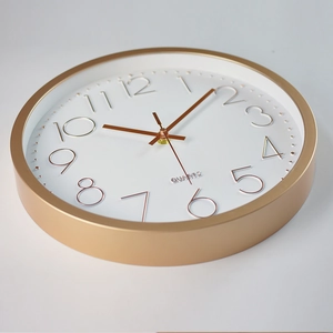 Modern 12-inch silent wall clock with rose gold frame and 3D numeric display