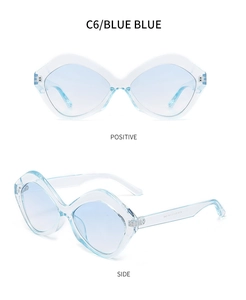 Detailed front and side views of transparent light blue geometric cat-eye sunglasses