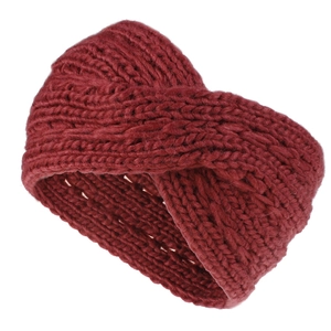 Close-up of deep red chunky knit headband with a twist knot in thick ribbed texture