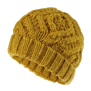 Detailed macro view of the thick ginger yellow diamond knit pattern on this winter hat