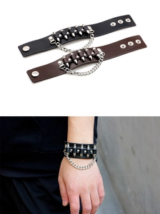 Punk leather wristbands with silver bullet spikes and metal chain detail for men