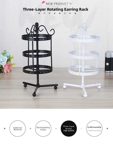Three-tier rotating metal earring display stand with solid iron heart top detail