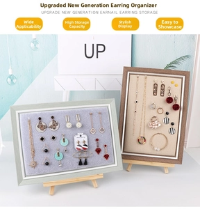 Wooden frame jewelry display stand with grey velvet lining and metal hooks for earrings
