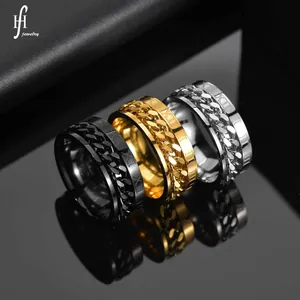 Detail of spinning stainless steel rings with Cuban chain and Roman numerals design