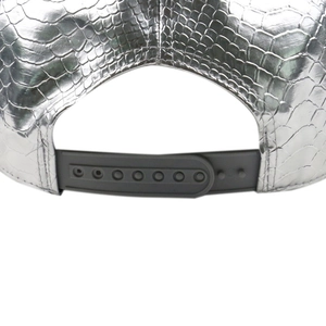 Close-up of silver snake skin PU leather baseball cap with grey plastic snapback closure