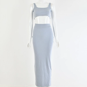 Front view of light blue ribbed knit two-piece set with crop top and high waist maxi skirt