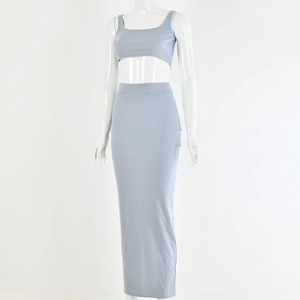 Detail of light blue ribbed knit two-piece set featuring crop top and bodycon skirt