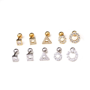 Set of 10 geometric zircon ear studs in gold and silver stainless steel on white back