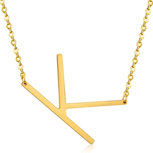 Macro view of 18K gold plated stainless steel necklace featuring a letter K pendant