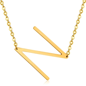 Detailed close-up of 18K gold plated letter N pendant necklace on white background