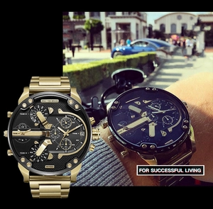 Detail view of large gold multi-timezone quartz watch with four independent dials