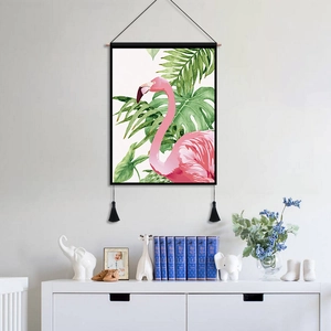 Nordic flamingo wall art hanging with tropical leaves and elegant black tassels